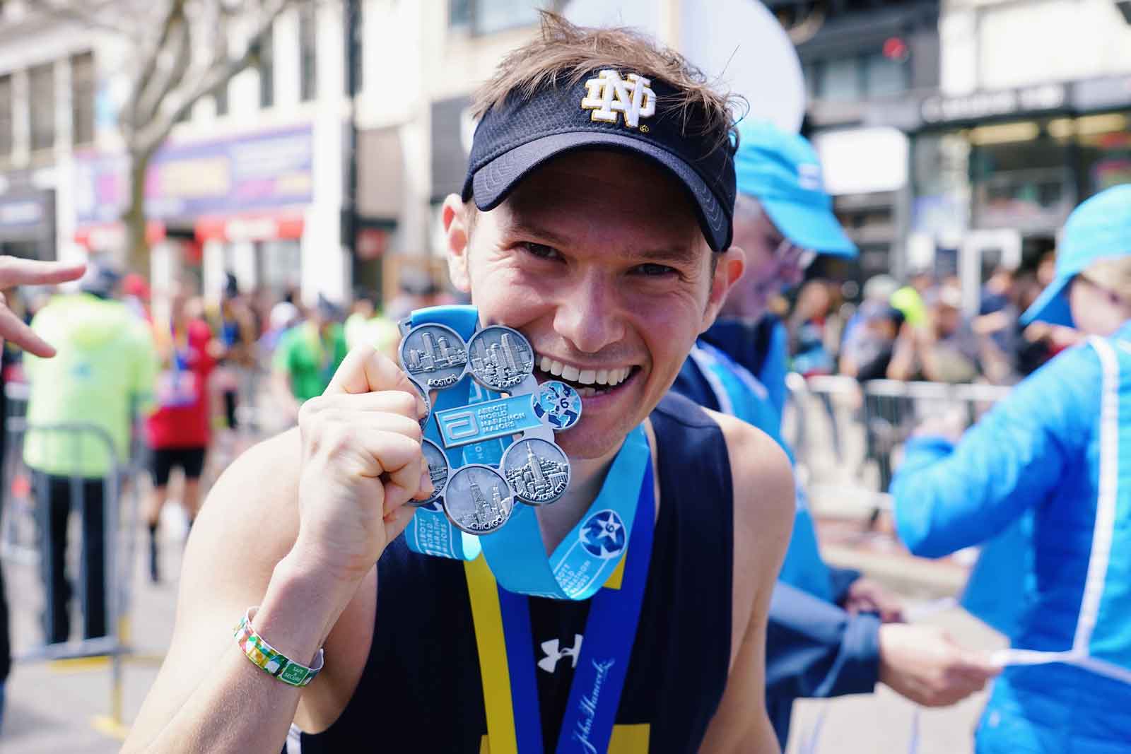 Six Star finisher biting medal