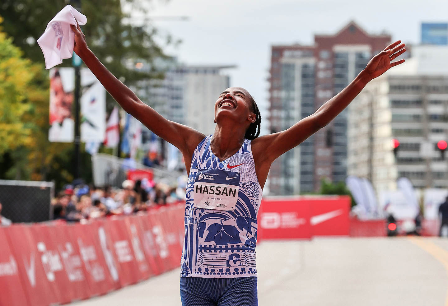 Sifan Hassan celebrates winning the Chicago Marathon in 2023 