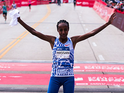Sifan Hassan celebrates winning the 2023 Chicago Marathon