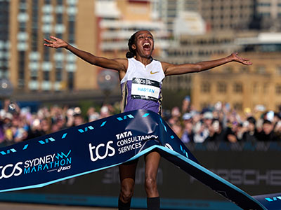 Sifan Hassan celebrates winning in Sydney