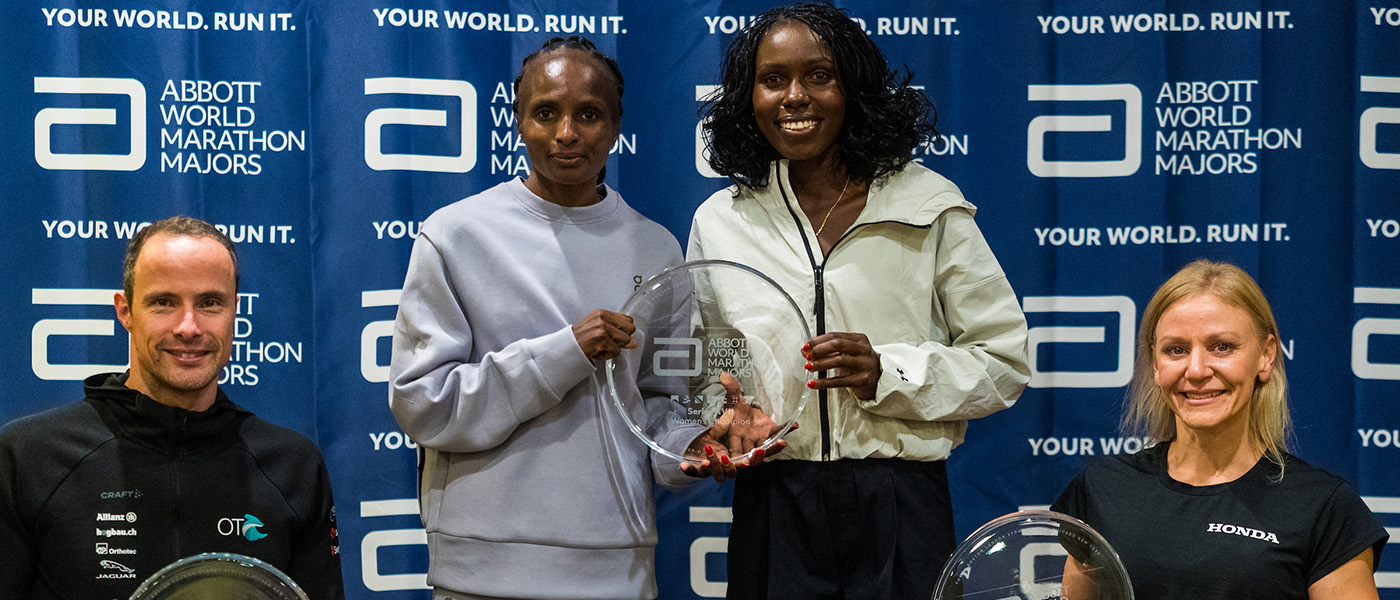 Marcel Hug, Hellen Obiri, Sharon Lokedi and Susannah Scaroni with their trophies